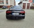 Черный Ауди А6, объемом двигателя 1.98 л и пробегом 142 тыс. км за 18300 $, фото 1 на Automoto.ua
