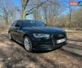 Чорний Ауді А6, об'ємом двигуна 1.98 л та пробігом 128 тис. км за 20500 $, фото 1 на Automoto.ua