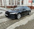 Черный Ауди А6, объемом двигателя 1.98 л и пробегом 142 тыс. км за 18300 $, фото 1 на Automoto.ua