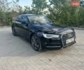 Черный Ауди А6, объемом двигателя 1.98 л и пробегом 77 тыс. км за 21500 $, фото 1 на Automoto.ua