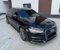Черный Ауди А6, объемом двигателя 2 л и пробегом 170 тыс. км за 13514 $, фото 1 на Automoto.ua