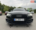 Черный Ауди А6, объемом двигателя 2 л и пробегом 180 тыс. км за 15800 $, фото 1 на Automoto.ua