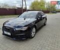 Черный Ауди А6, объемом двигателя 1.98 л и пробегом 142 тыс. км за 18300 $, фото 1 на Automoto.ua