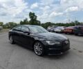 Черный Ауди А6, объемом двигателя 2 л и пробегом 56 тыс. км за 6117 $, фото 1 на Automoto.ua