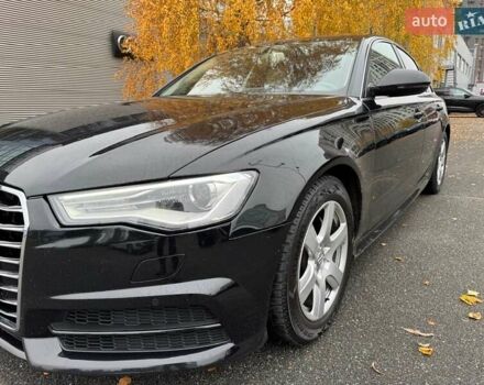 Черный Ауди А6, объемом двигателя 2 л и пробегом 140 тыс. км за 20000 $, фото 1 на Automoto.ua