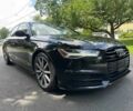 Черный Ауди А6, объемом двигателя 2 л и пробегом 30 тыс. км за 16450 $, фото 1 на Automoto.ua