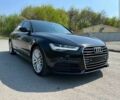 Черный Ауди А6, объемом двигателя 2 л и пробегом 100 тыс. км за 18500 $, фото 1 на Automoto.ua