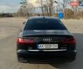 Черный Ауди А6, объемом двигателя 2 л и пробегом 184 тыс. км за 25000 $, фото 1 на Automoto.ua