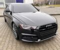 Черный Ауди А6, объемом двигателя 2 л и пробегом 64 тыс. км за 25000 $, фото 1 на Automoto.ua