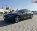 Черный Ауди А6, объемом двигателя 2 л и пробегом 92 тыс. км за 29000 $, фото 1 на Automoto.ua