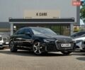 Черный Ауди А6, объемом двигателя 2 л и пробегом 94 тыс. км за 33700 $, фото 1 на Automoto.ua