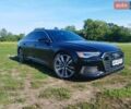 Черный Ауди А6, объемом двигателя 3 л и пробегом 100 тыс. км за 23300 $, фото 1 на Automoto.ua