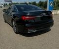 Черный Ауди А6, объемом двигателя 3 л и пробегом 65 тыс. км за 33500 $, фото 1 на Automoto.ua