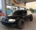 Черный Ауди А6, объемом двигателя 2.4 л и пробегом 300 тыс. км за 1900 $, фото 1 на Automoto.ua