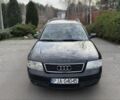 Черный Ауди А6, объемом двигателя 1.8 л и пробегом 300 тыс. км за 1750 $, фото 1 на Automoto.ua