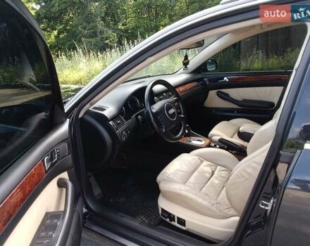 Ауді А6 2001 у Харкові на Automoto.ua Чорний Ауді А6, об'ємом двигуна 0 л та пробігом 310 тис. км за 3200 $, фото 2 на Automoto.ua