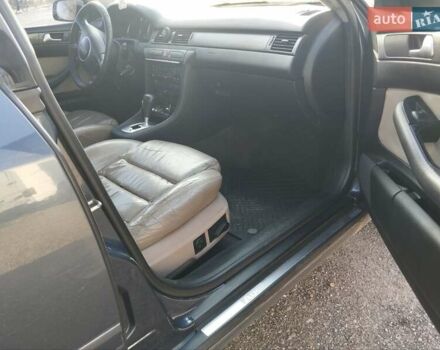 Черный Ауди А6, объемом двигателя 2.5 л и пробегом 248 тыс. км за 1750 $, фото 4 на Automoto.ua