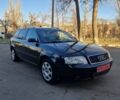 Черный Ауди А6, объемом двигателя 2 л и пробегом 285 тыс. км за 6000 $, фото 1 на Automoto.ua