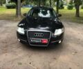 Черный Ауди А6, объемом двигателя 2 л и пробегом 290 тыс. км за 6490 $, фото 1 на Automoto.ua