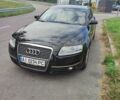 Черный Ауди А6, объемом двигателя 2 л и пробегом 263 тыс. км за 8750 $, фото 1 на Automoto.ua