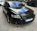 Черный Ауди А6, объемом двигателя 2 л и пробегом 285 тыс. км за 7250 $, фото 1 на Automoto.ua