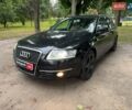 Черный Ауди А6, объемом двигателя 2 л и пробегом 290 тыс. км за 7490 $, фото 1 на Automoto.ua