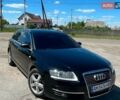 Черный Ауди А6, объемом двигателя 2 л и пробегом 320 тыс. км за 6600 $, фото 1 на Automoto.ua