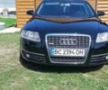 Черный Ауди А6, объемом двигателя 1.97 л и пробегом 420 тыс. км за 7700 $, фото 1 на Automoto.ua