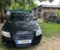Черный Ауди А6, объемом двигателя 2 л и пробегом 300 тыс. км за 8400 $, фото 1 на Automoto.ua