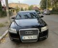 Черный Ауди А6, объемом двигателя 2 л и пробегом 290 тыс. км за 7528 $, фото 1 на Automoto.ua