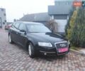 Черный Ауди А6, объемом двигателя 2 л и пробегом 243 тыс. км за 8200 $, фото 1 на Automoto.ua