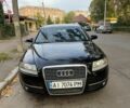 Черный Ауди А6, объемом двигателя 1.98 л и пробегом 290 тыс. км за 7500 $, фото 1 на Automoto.ua