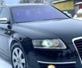 Чорний Ауді А6, об'ємом двигуна 2 л та пробігом 296 тис. км за 8499 $, фото 1 на Automoto.ua