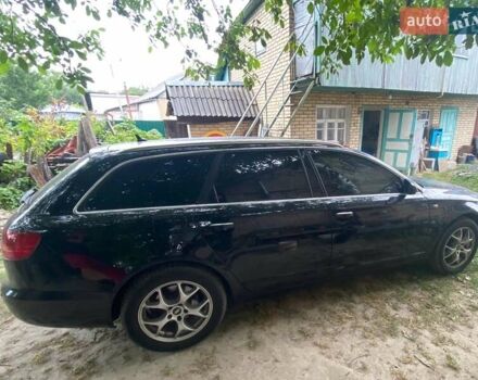 Черный Ауди А6, объемом двигателя 2 л и пробегом 300 тыс. км за 8400 $, фото 1 на Automoto.ua