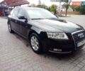 Черный Ауди А6, объемом двигателя 2 л и пробегом 265 тыс. км за 12500 $, фото 1 на Automoto.ua