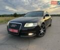 Черный Ауди А6, объемом двигателя 2 л и пробегом 321 тыс. км за 11800 $, фото 1 на Automoto.ua