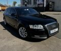 Черный Ауди А6, объемом двигателя 2 л и пробегом 324 тыс. км за 11500 $, фото 1 на Automoto.ua