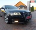Чорний Ауді А6, об'ємом двигуна 2 л та пробігом 236 тис. км за 11499 $, фото 1 на Automoto.ua