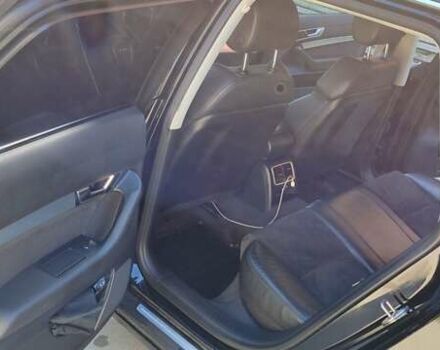 Черный Ауди А6, объемом двигателя 2 л и пробегом 228 тыс. км за 10500 $, фото 1 на Automoto.ua