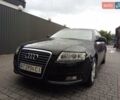 Черный Ауди А6, объемом двигателя 2 л и пробегом 265 тыс. км за 12500 $, фото 1 на Automoto.ua