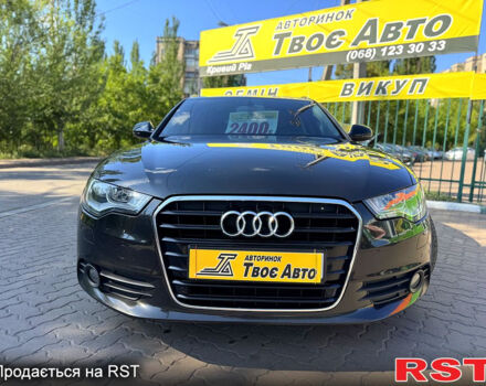 Черный Ауди А6, объемом двигателя 2 л и пробегом 298 тыс. км за 13300 $, фото 1 на Automoto.ua