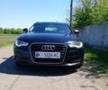 Черный Ауди А6, объемом двигателя 2 л и пробегом 305 тыс. км за 15000 $, фото 1 на Automoto.ua