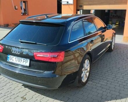 Черный Ауди А6, объемом двигателя 2 л и пробегом 263 тыс. км за 15000 $, фото 1 на Automoto.ua