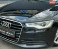 Черный Ауди А6, объемом двигателя 1.97 л и пробегом 378 тыс. км за 12500 $, фото 1 на Automoto.ua