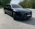 Чорний Ауді А6, об'ємом двигуна 1.97 л та пробігом 318 тис. км за 13399 $, фото 1 на Automoto.ua