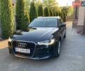 Черный Ауди А6, объемом двигателя 2 л и пробегом 150 тыс. км за 18300 $, фото 1 на Automoto.ua