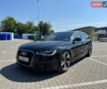Черный Ауди А6, объемом двигателя 2 л и пробегом 244 тыс. км за 15800 $, фото 1 на Automoto.ua