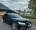 Черный Ауди А6, объемом двигателя 2 л и пробегом 380 тыс. км за 13500 $, фото 1 на Automoto.ua