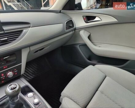 Черный Ауди А6, объемом двигателя 2 л и пробегом 294 тыс. км за 12800 $, фото 1 на Automoto.ua