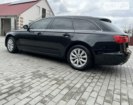 Черный Ауди А6, объемом двигателя 2 л и пробегом 247 тыс. км за 15200 $, фото 1 на Automoto.ua